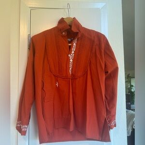 Mi Golondrina Burnt orange tuxedo front cotton blouse with white embroidery